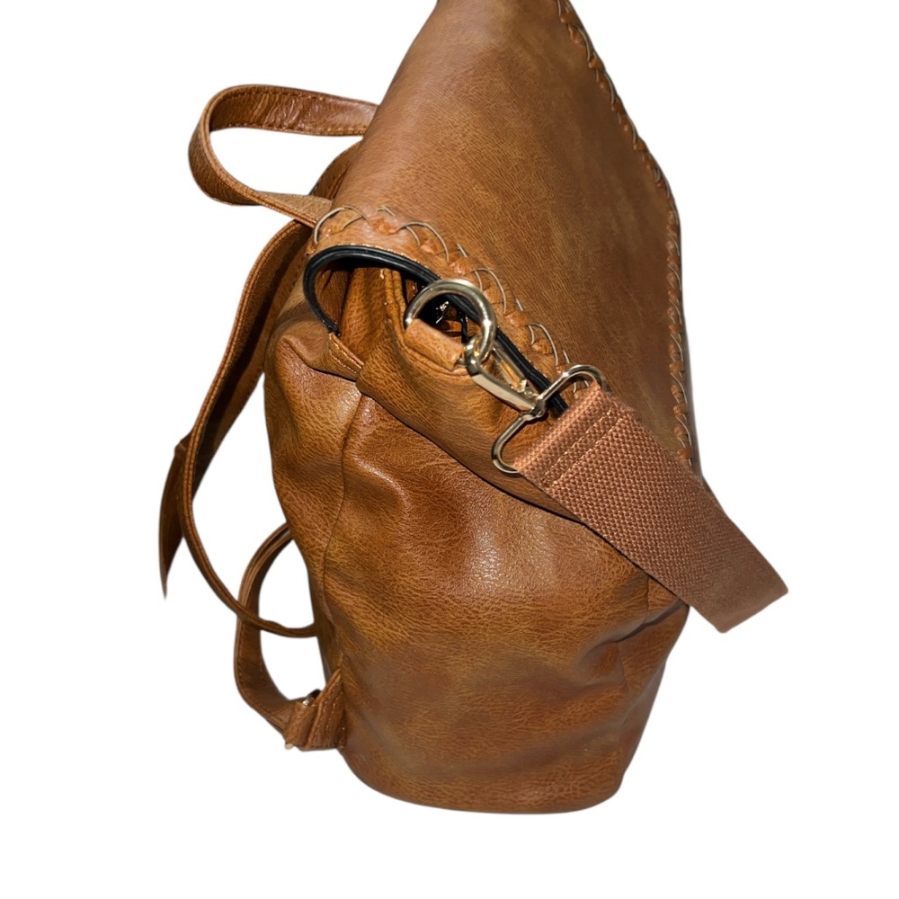 Brown Leather Crossbody & Backpack. Cheetah print in the inside